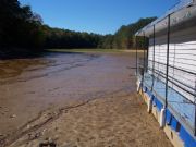 Lake Martin&nbsp;Houseboat sitting on dry lake bed