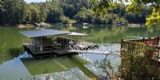 Smith Lake&nbsp;Owner built boat house, swim deck, and walkway, boathouse 32x34 plus 2 foot overhang, swim deck 12X19, walkway 45 ft length. one 28X11 foot slip, one 24X11 slip.